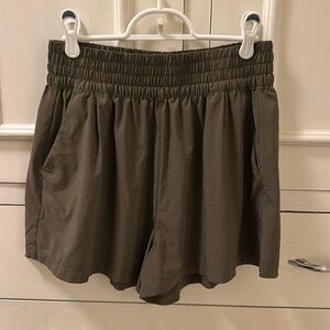 High waisted green vuori short size M with pockets